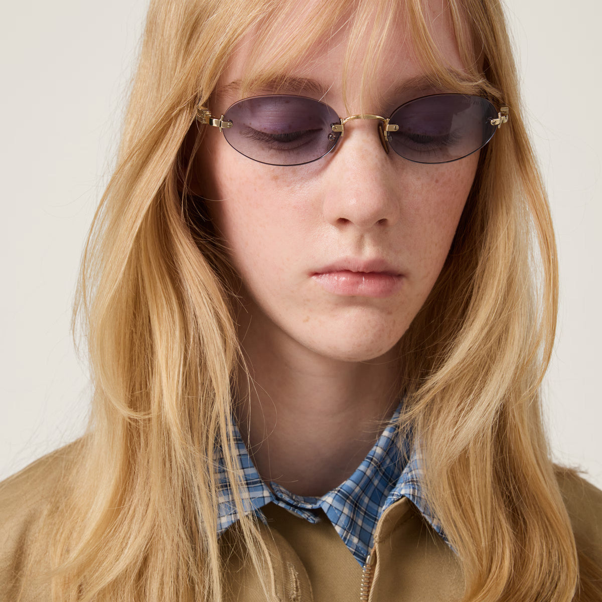 Miu Miu Women Rimless Oval Indigo Sunglasses
