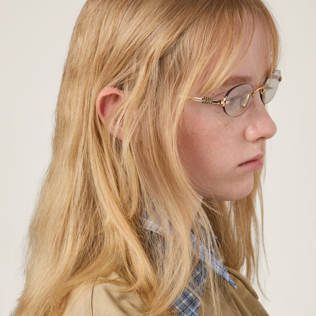 Miu Miu Women's MU A54S Rimless Oval – Gold / Clear Blue-ray Transparent Glasses