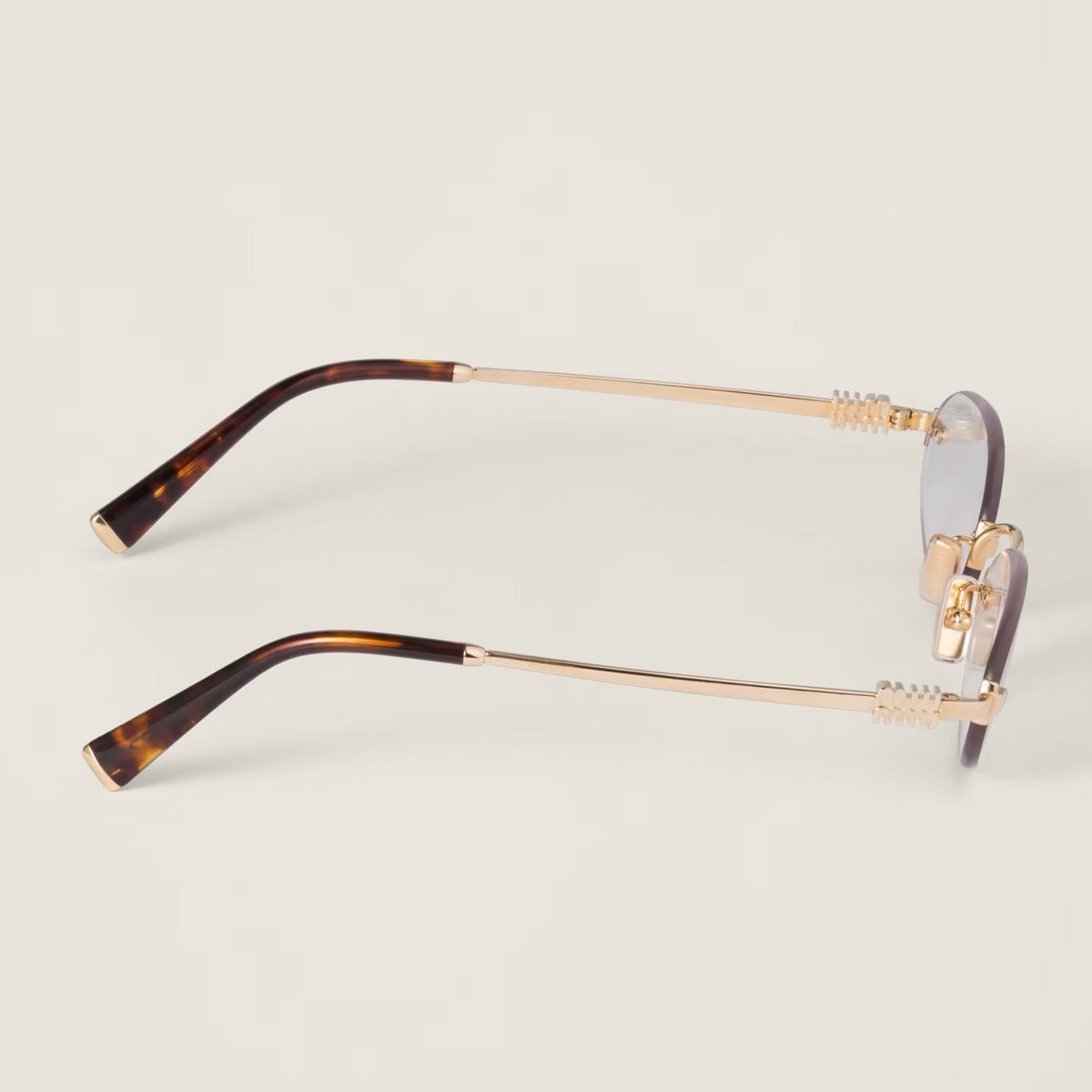 Miu Miu Women's MU A54S Rimless Oval – Gold / Clear Blue-ray Transparent Glasses