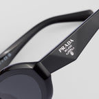 Prada Women Oval Frame Lava Black Sunglasses