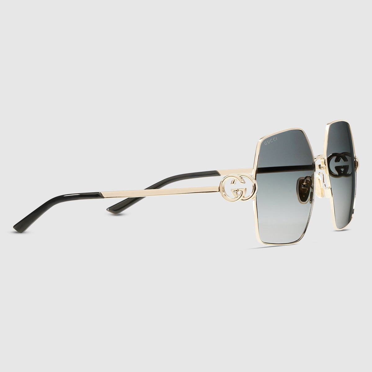 Gucci Women Oval Frame Shiny Gold Toned Sunglasses