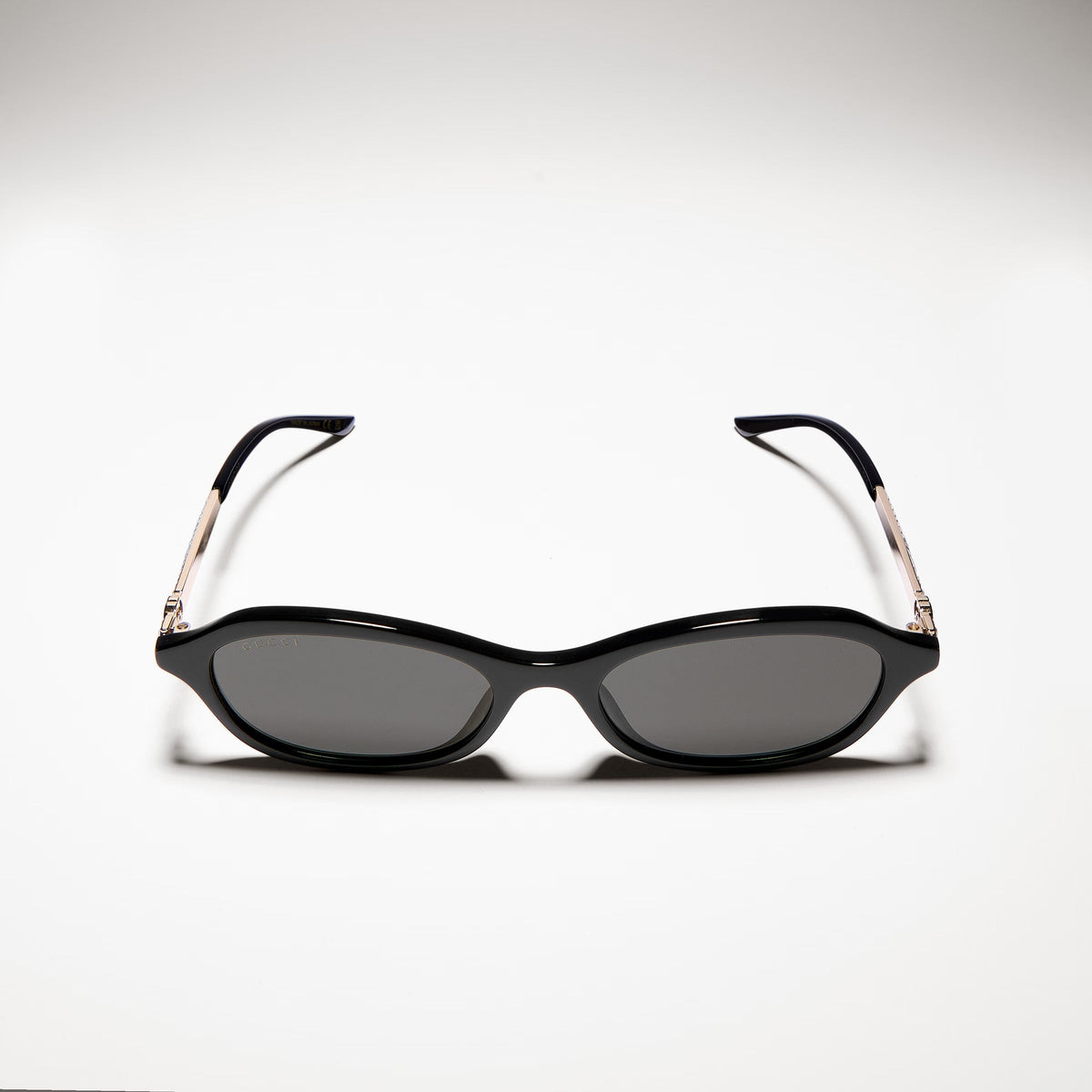 Gucci Women Oval Frame Natural Black sunglasses
