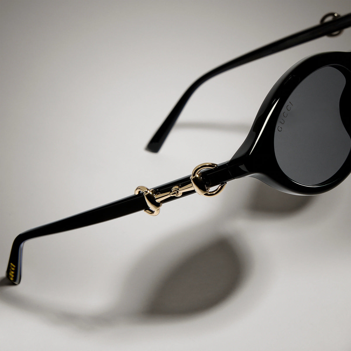 Gucci Women Cat-eye Frame Shiny Natural Black Sunglasses