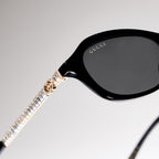 Gucci Women Oval Frame Natural Black sunglasses