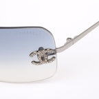 Chanel Coco Rhinestone Rimless Light Blue Sunglasses